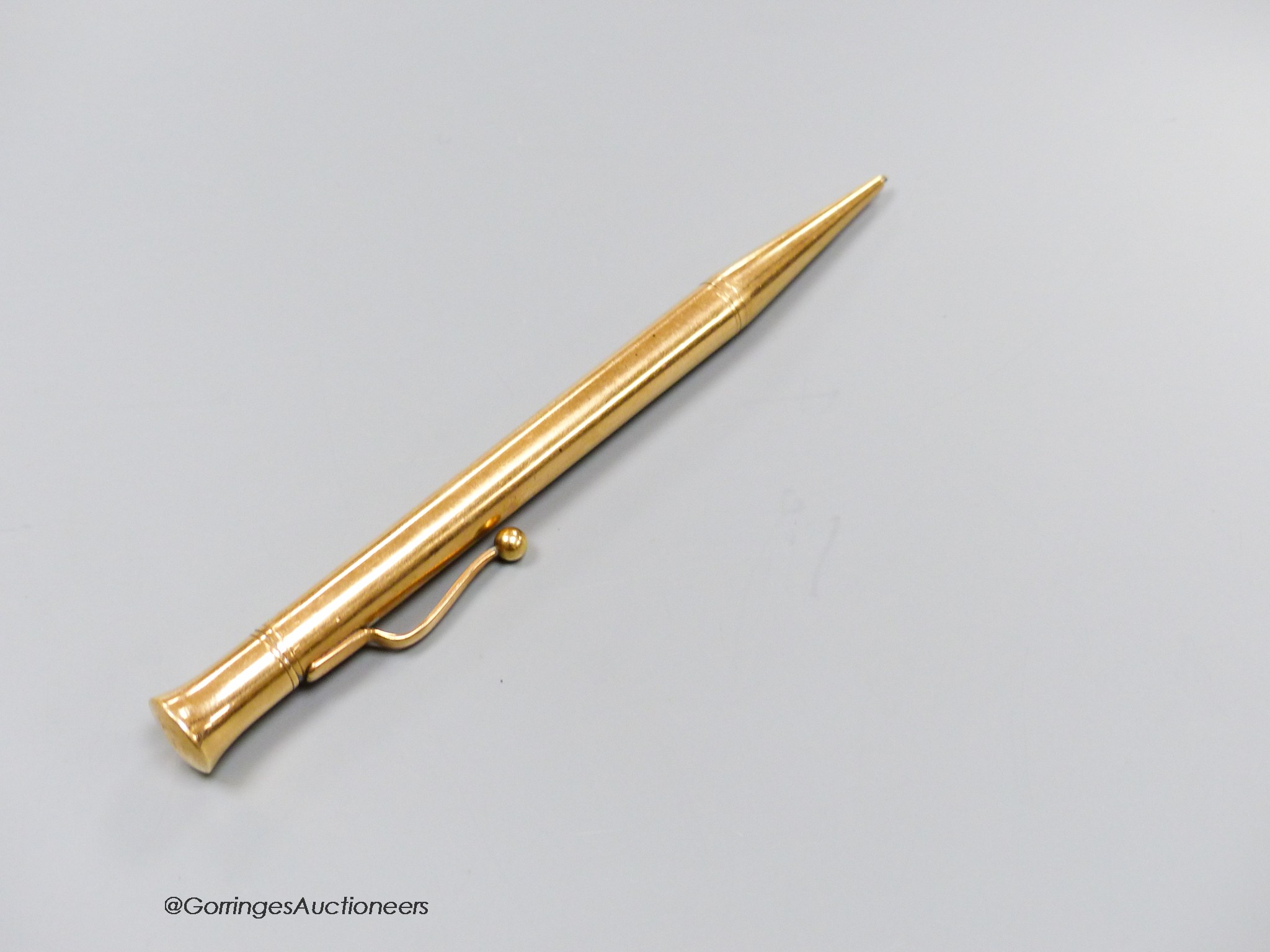 A 1950's 9ct gold cased propelling pencil.